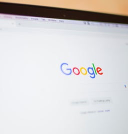 Laptop screen showing Google homepage