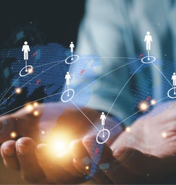 The palm of someone's hands with a graphic overay depicitng customers at different map locations