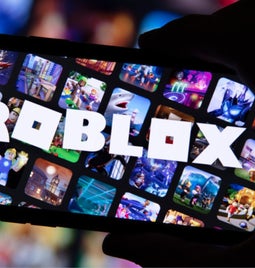 Phone screen showing the Roblox logo