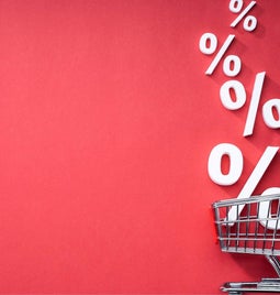 Photo of a cart with percentage signs coming out of it