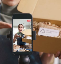 Person live streaming a product showcase