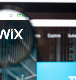 Magnified look at the Wix logo on its website homepage