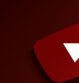A red YouTube play button with a white triangle on a dark red background.