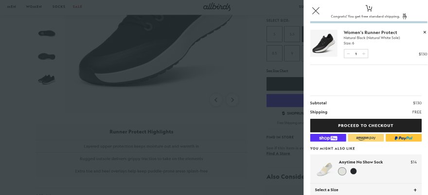 Photo of a checkout pop-up on Allbird's footwear store with express checkout options and a pair of trainers in cart